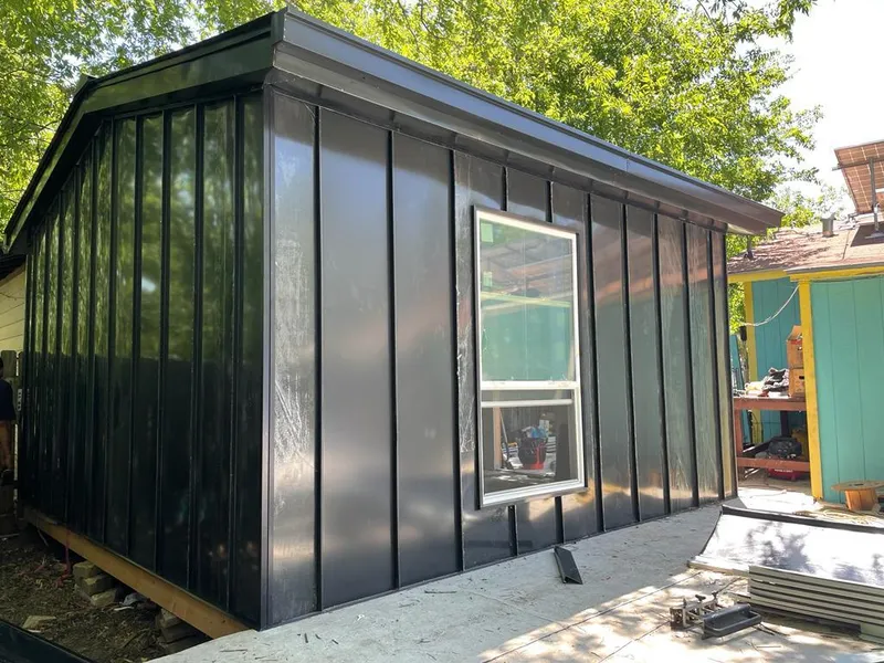 Black standing seam metal wall panels for Metal Roof Installation in Hooksett