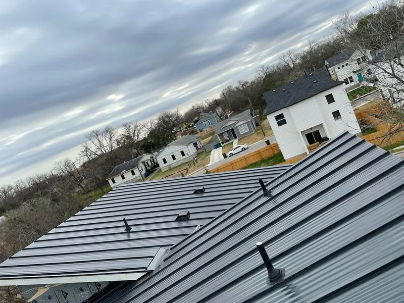 Standing seam metal roof panels with vents for Skylight Repair in Hooksett